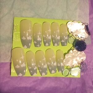 Cloudy choice matching nails and earrings